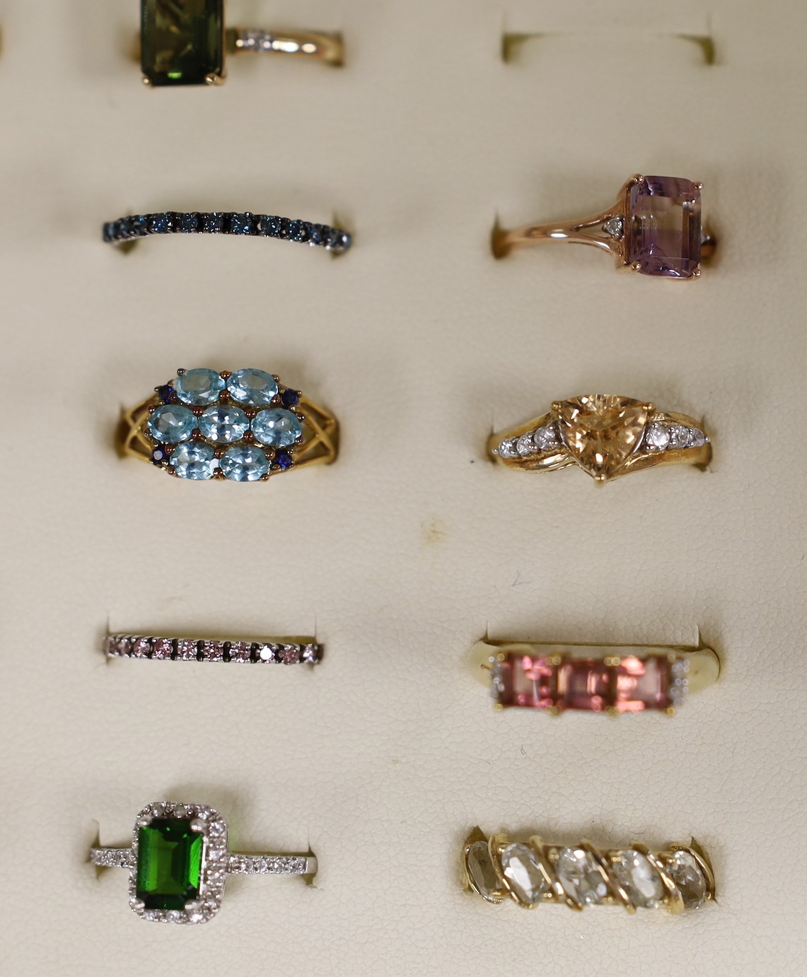 Thirty nine assorted modern 9ct gold and gem set dress rings, including amethyst and garnet and two 18ct gold and gem set rings, in ring box.